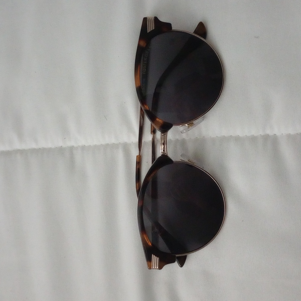 Sunglasses case included